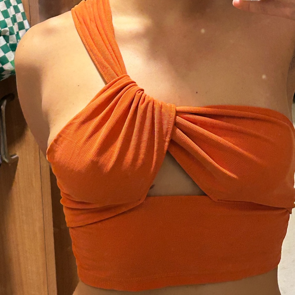 Urban Outfitters orange one shoulder crop top
